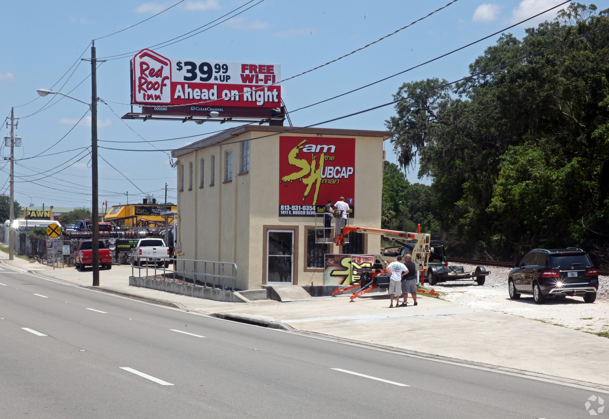 1411 E Busch Blvd, Tampa, FL 33604 Sam the Hubcap Man