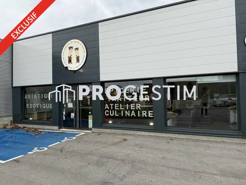 Retail in Quetigny for lease - Building Photo - Image 1 of 12