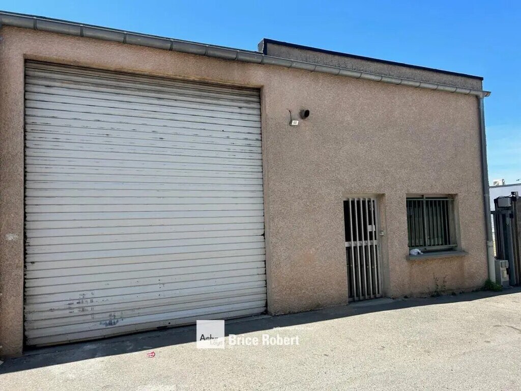 Location Local d'activités 310 m² - Photo 1