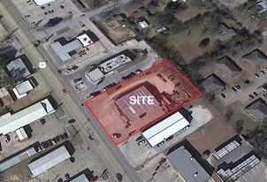 FURTHER REDUCED! +/- 8,000 SF Building - Owner Financed Property