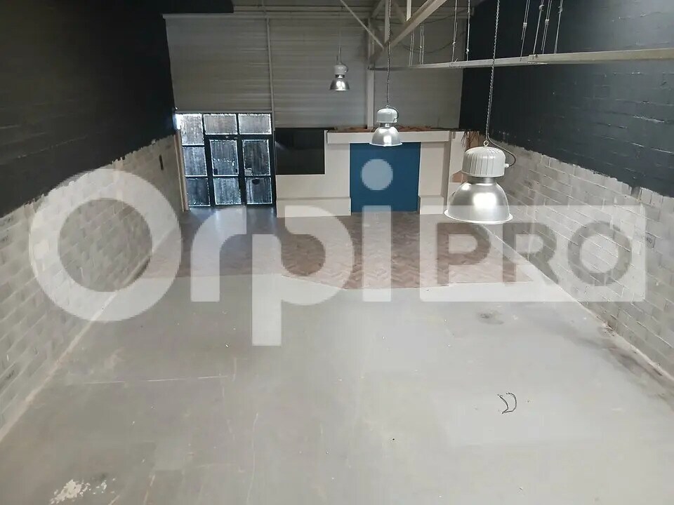 Location Commerce 310 m² - Photo 1