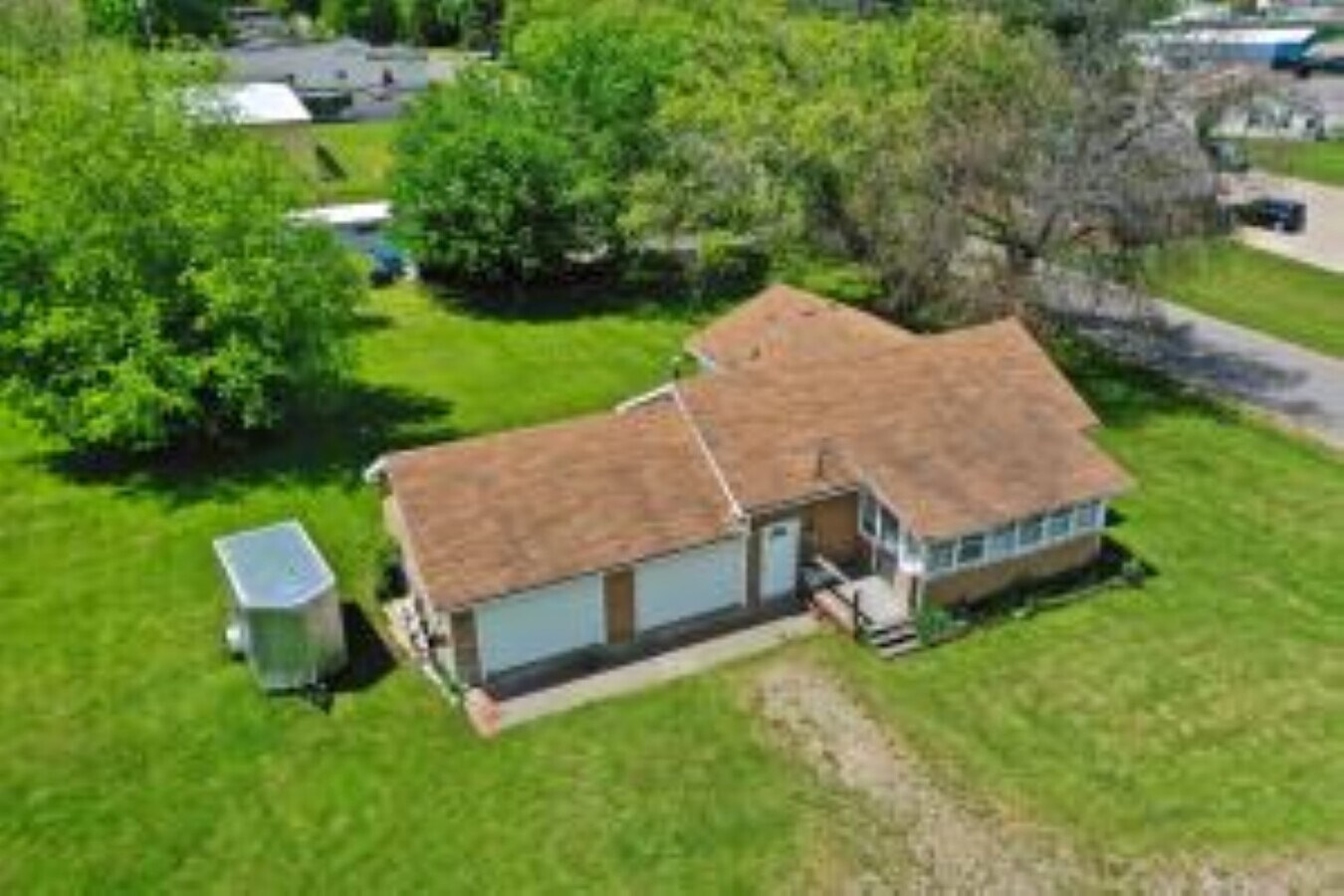 103 Beech St, Houghton Lake, MI 48629