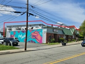 10 Unit Mixed Use Property with Upside - Parking Garage