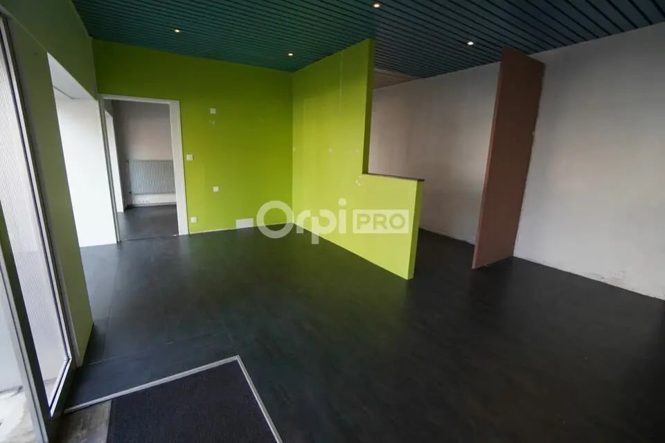 Location Commerce 115 m² - Photo 1