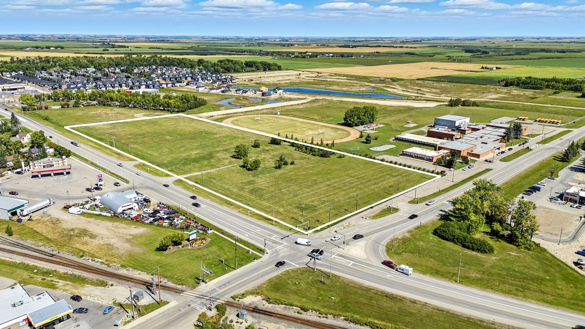Intersection of Highway 581 and Highway 2A, Carstairs, AB for sale Aerial- Image 1 of 12