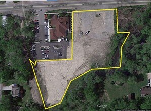 401 W Commerce Rd, Commerce Township, MI - aerial  map view