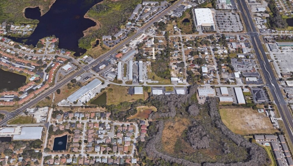 4050-4060 Louis Ave, Holiday, FL for lease - Building Photo - Image 1 of 14