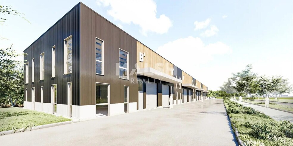 Flex in Saint-Clair-de-la-Tour for lease - Building Photo - Image 1 of 10