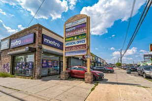 7-Tenant Shopping Center w/20-Car Parking Lot - Parking Garage