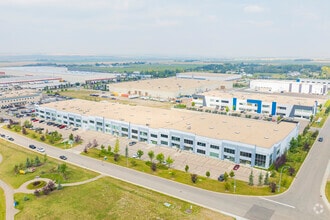 18 Highland Park Way NE, Airdrie, AB - AERIAL  map view - Image1