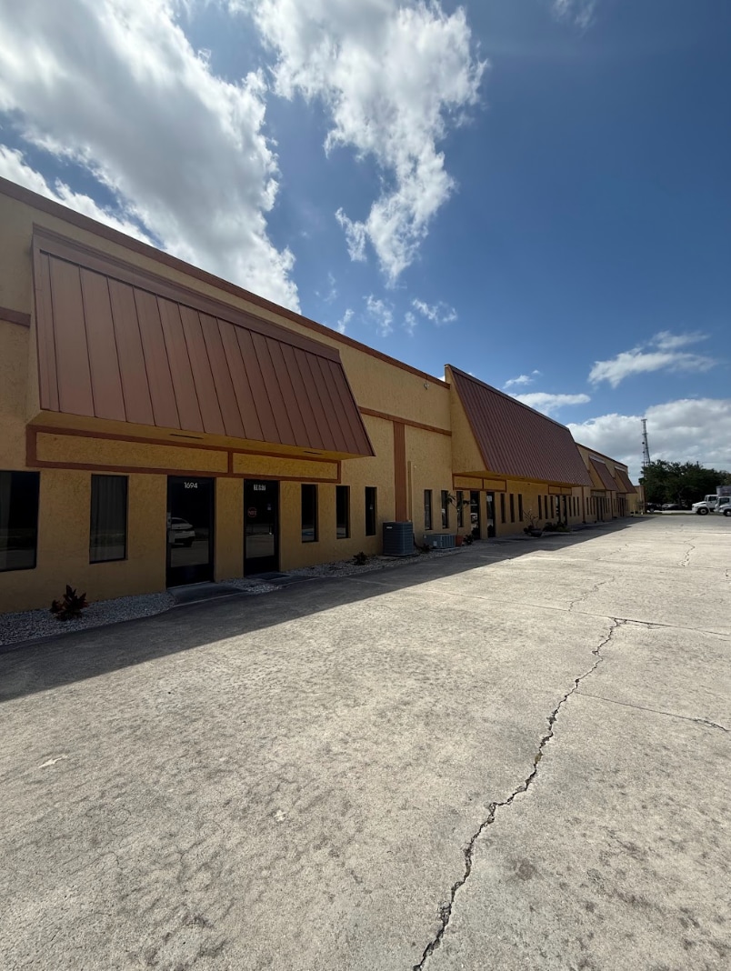 1634 SE Village Green Dr, Port Saint Lucie, FL for lease Building Photo- Image 1 of 4