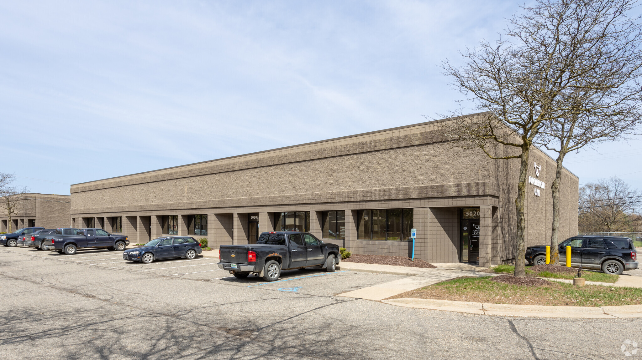 50200-50210 Dennis Industrial Ct, Wixom, MI for lease Building Photo- Image 1 of 7