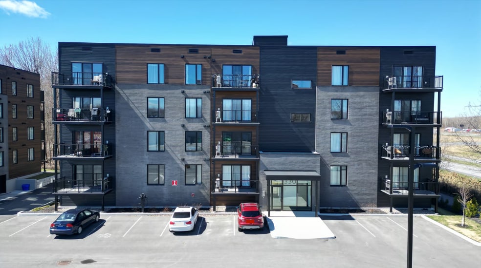 Multifamily in Les Coteaux, QC for sale - Primary Photo - Image 1 of 1