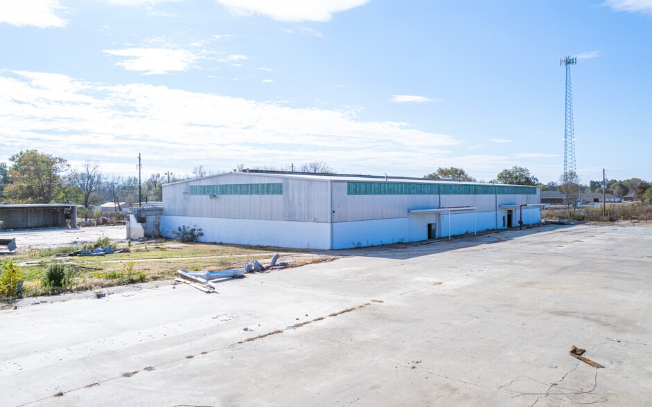 560 W 2nd St, Booneville, AR 72927 Former ACE Comb Facility