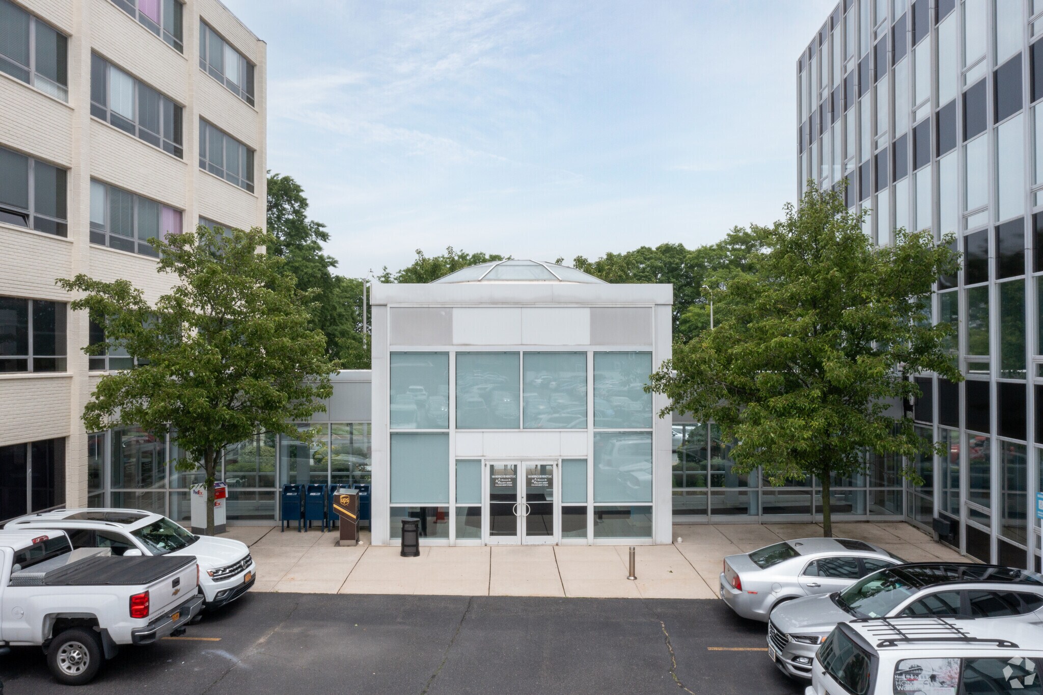 100 Merrick Rd, Rockville Centre, NY 11570 East & West Building