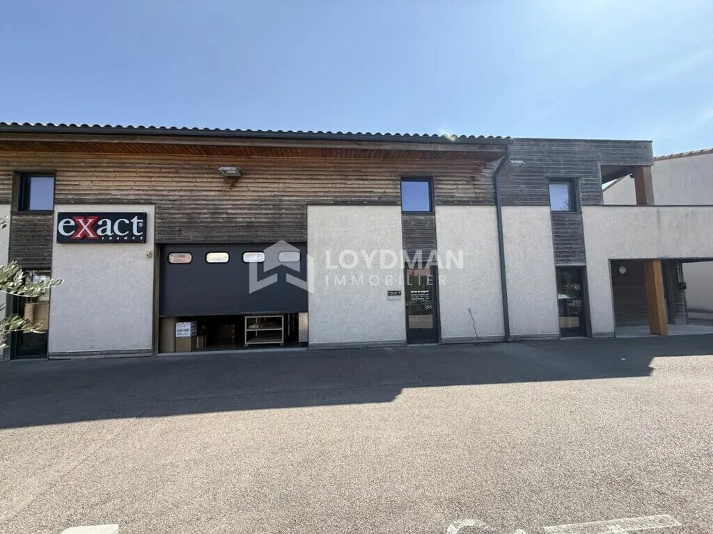 Location Commerce 580 m² - Photo 1