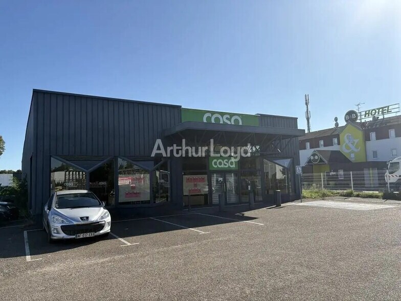 Retail in Ostwald for lease - Building Photo - Image 1 of 12