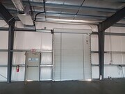 Grade level roll up doors