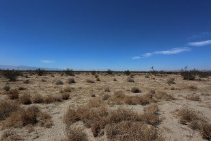 Bellflower St, Adelanto CA - Motel