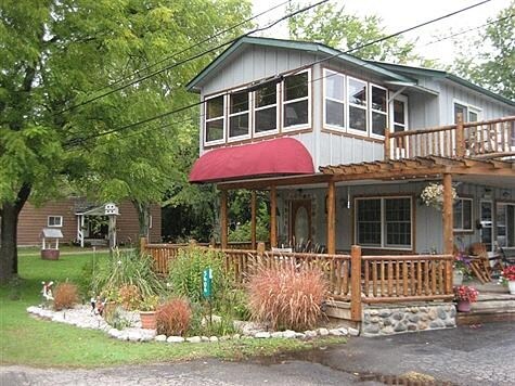 5606 Eight Mile Rd, Onekama, MI for sale - Primary Photo - Image 1 of 1