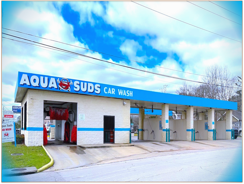 610 W Main St, Tomball, TX 77375 AQUA SUDS Car Wash