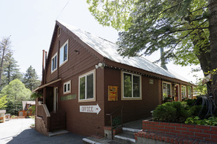 Sleepy Hollow Cabins & Hotel - Motel