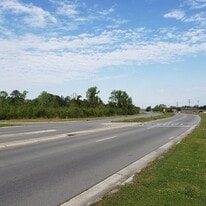 Tract with Most Inclusive Commercial Zoning - Land