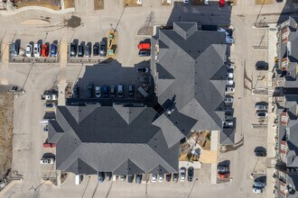 101 Sunset Dr, Cochrane, AB - AERIAL  map view - Image1