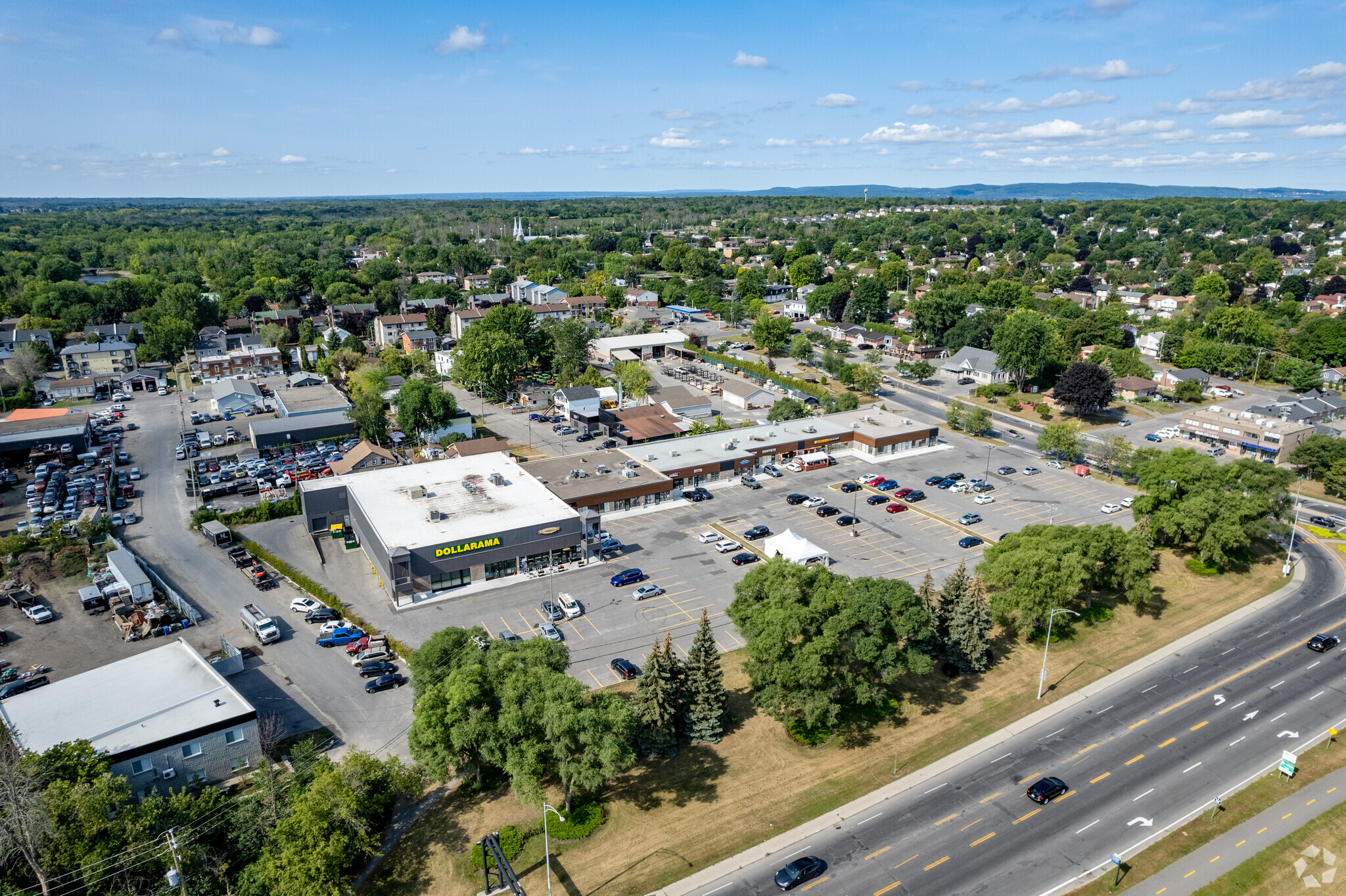 100-136 Boul Jacques-Bizard, Montréal, QC for lease Aerial- Image 1 of 6