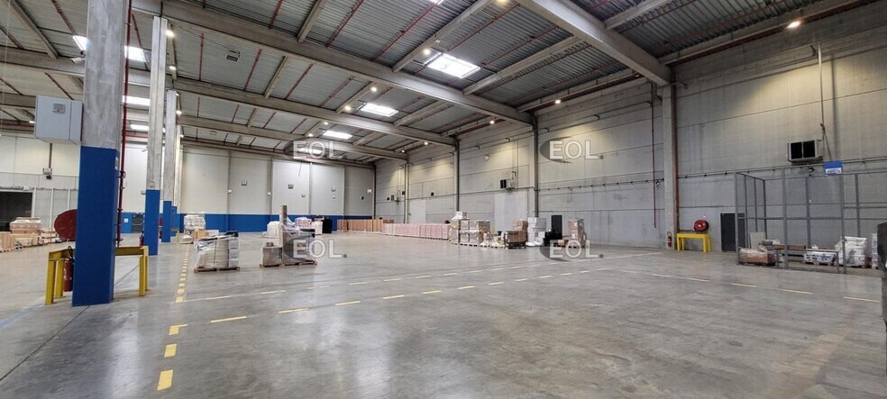 Industrial in Pusignan for lease - Building Photo - Image 1 of 3
