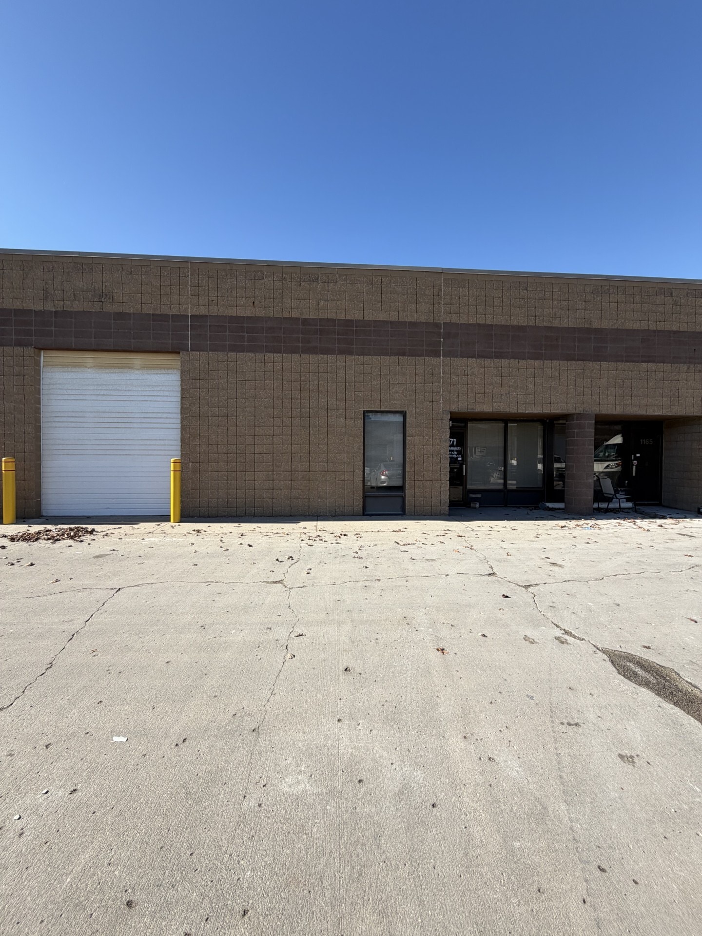 1125-1147 W Dennis Ave, Olathe, KS for lease Building Photo- Image 1 of 7