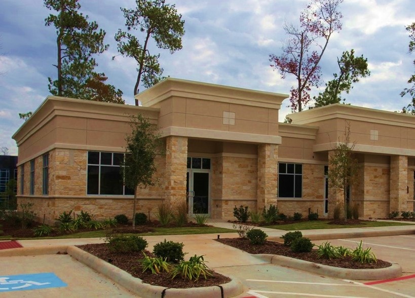 Aerial view of 8505 Technology Forest Place showcasing modern homes with integrated technology and lush green spaces,