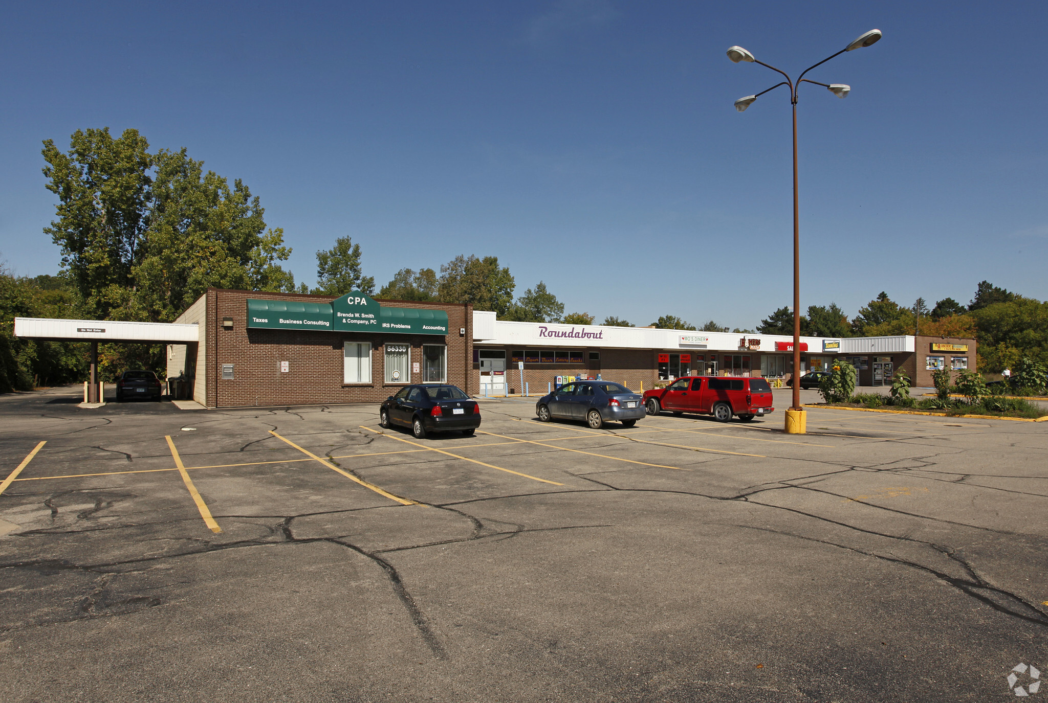 56270-56330 Grand River Ave, New Hudson, MI for lease Building Photo- Image 1 of 7