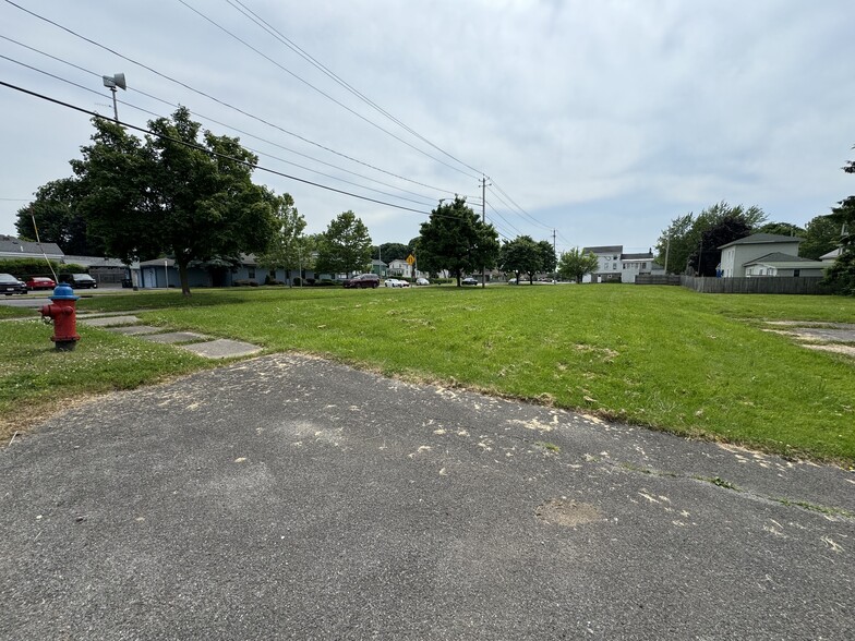 75-83 W Utica St, Oswego, NY for sale - Building Photo - Image 2 of 8