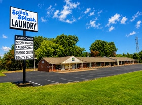 MULTI TENANT SHOPPING CENTER FOR SALE - Parking Garage
