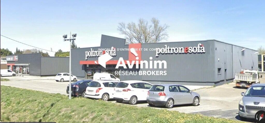 Location Commerce 1 100 m² - Photo 1