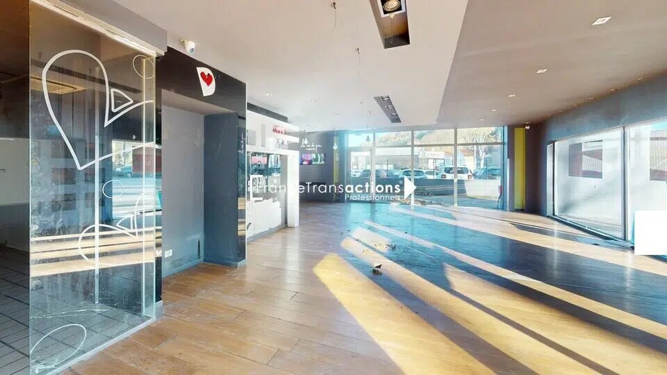 Location Commerce 165 m² - Photo 1