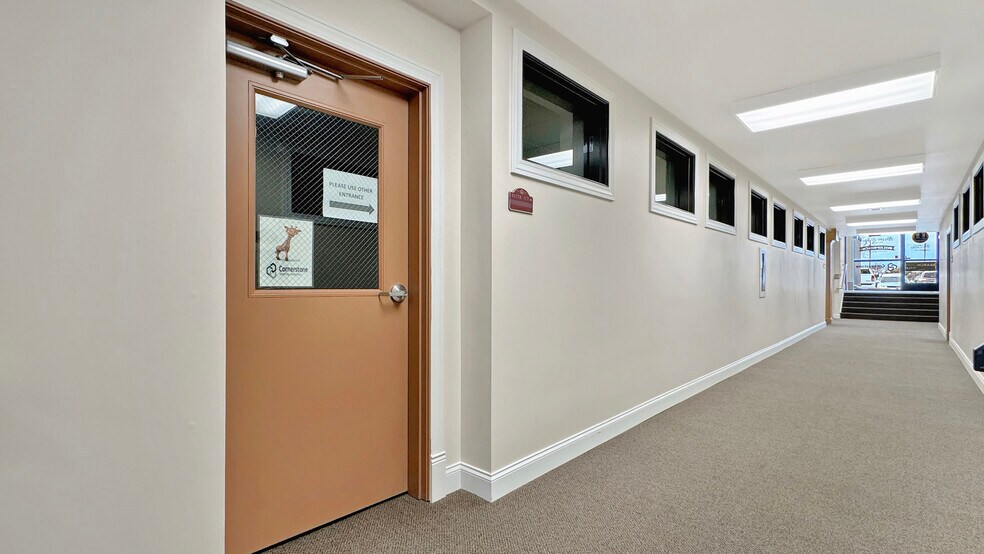 117 N Mitchell St, Cadillac, MI for lease - Building Photo - Image 1 of 20