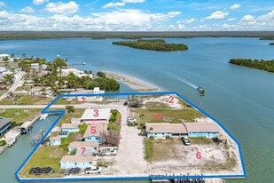 301-305 Pear Tree Ave & 107, 108, 109, 110, 111 East Ct., Goodland FL - Motel