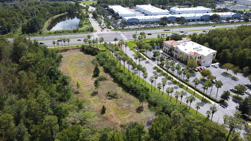 E Sandlake Rd, Orlando, FL for sale - Building Photo - Image 2 of 10