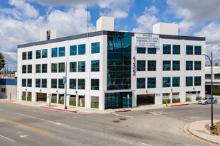 23,485 SF Office Bldg+0.33AC Parking Lot - Parking Garage