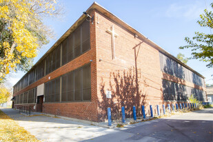 Former School Building & Adjacent Vacant Lot - Parking Garage