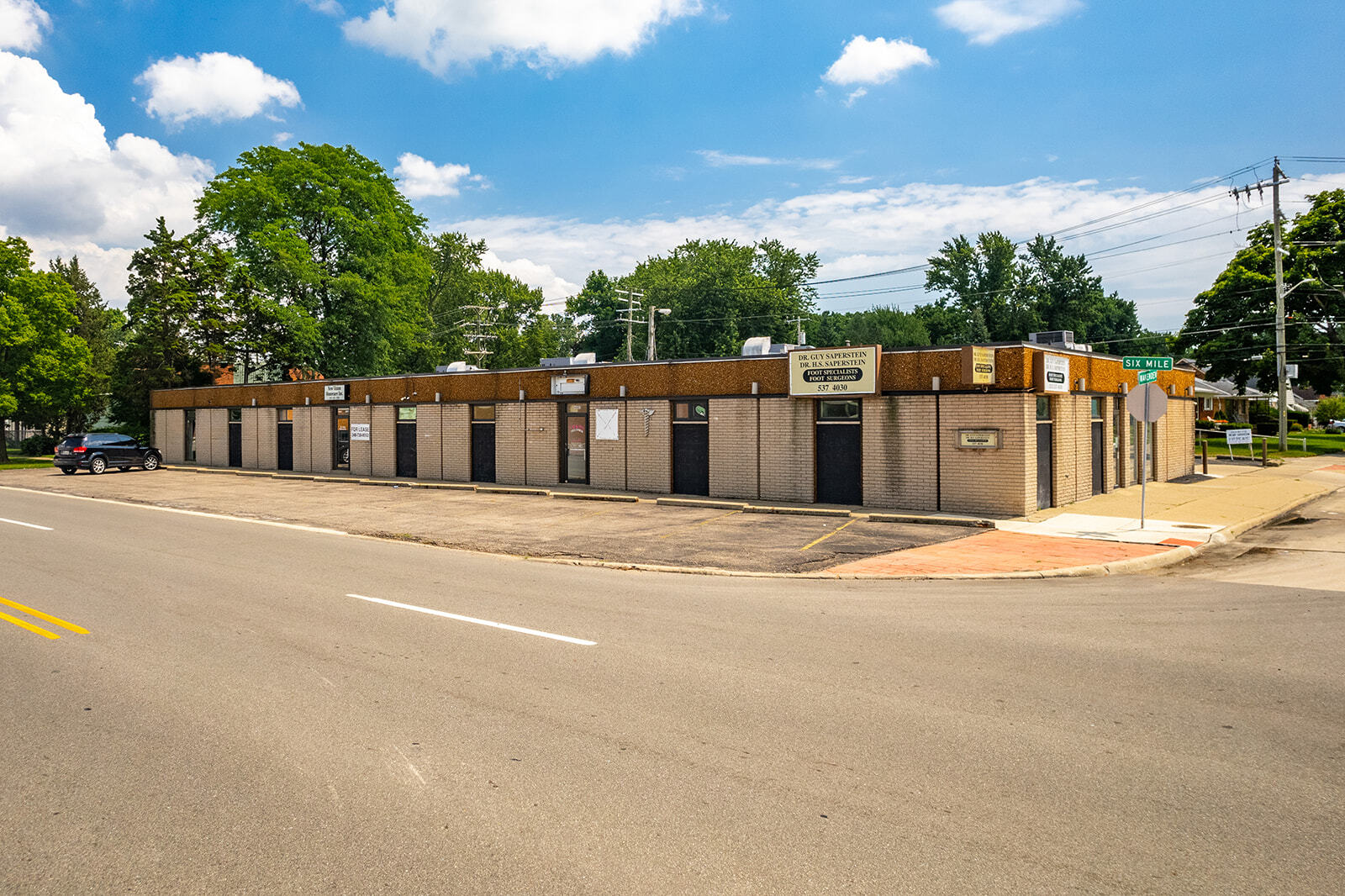 26045-26095 W 6 Mile Rd, Redford, MI for sale Building Photo- Image 1 of 1