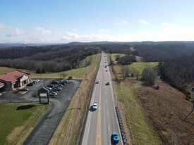 85 ac Development Land and former Bank - Motel