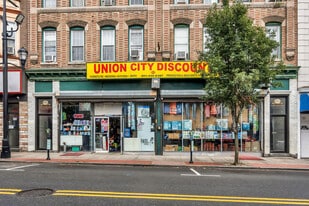 Mixed Used Building 8 Apt. 2 stores for sale - Parking Garage